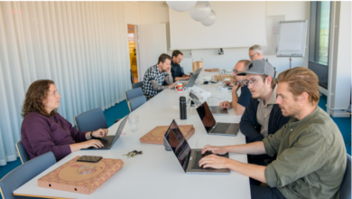 Team collaborating on a project during an AI hackathon