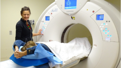 Radiologic technologist operating imaging equipment, reflecting radiology technologist salary roles