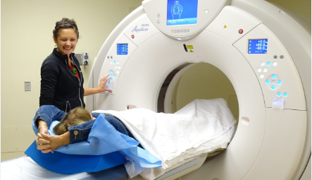 Radiologic technologist operating imaging equipment, reflecting radiology technologist salary roles