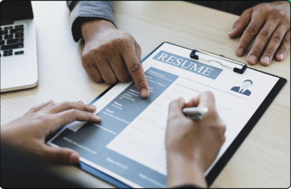 Job seeker tailoring a resume with Jobsuit AI while reviewing a job posting
